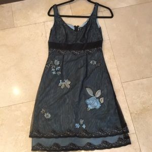 Teal dinner dress with flower embroidery
